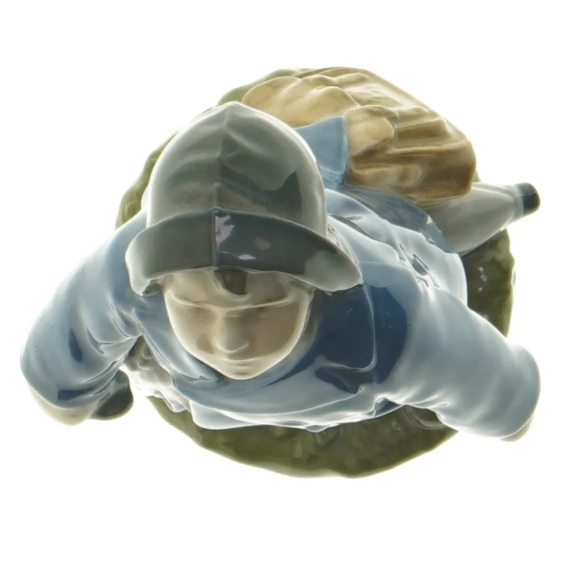 Porcelænsfigur med frakke og paraply fra Royal Copenhagen (str. 18,5 cm)