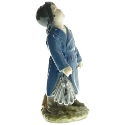 Porcelænsfigur med frakke og paraply fra Royal Copenhagen (str. 18,5 cm)