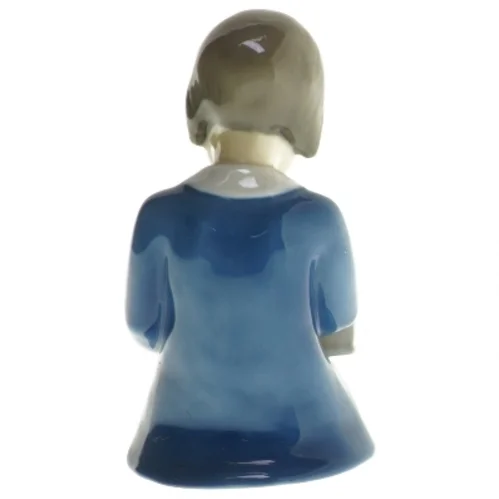 Porcelænsfigur af barn læsende fra B&G (str. 11x11,5 cm)