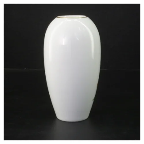 Porcelænsvase med blomsterdekoration (str. 16 cm)