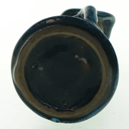 Keramikfigur af en kvinde (str. 15 cm)