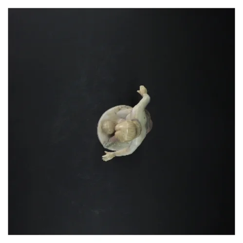 Porcelænsfigur af fodboldspiller (str. 22 cm)