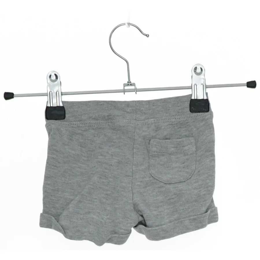 Grå shorts med turkis snøre fra H&M (str. 56)