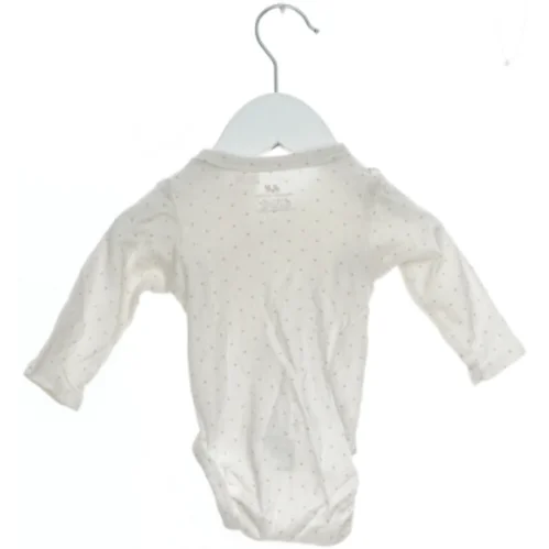 Langærmet bodystocking med prikker fra H&M (str. 56)