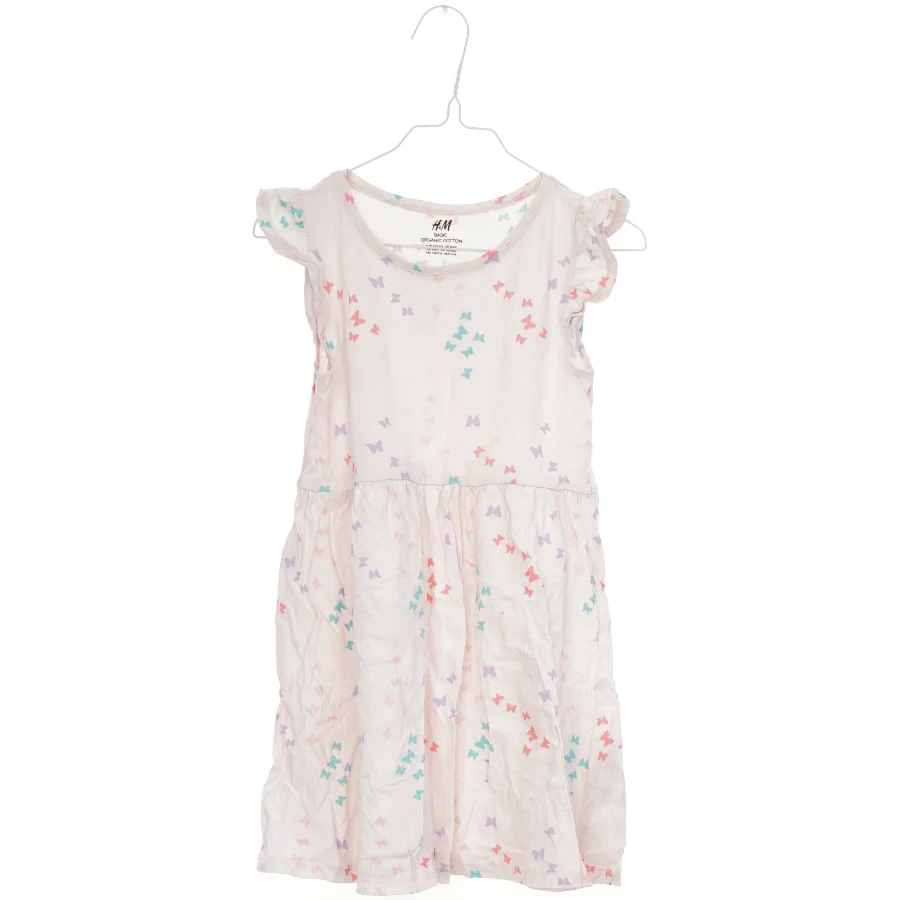 Kjole med sommerfuglemønster fra H&M (str. 110)