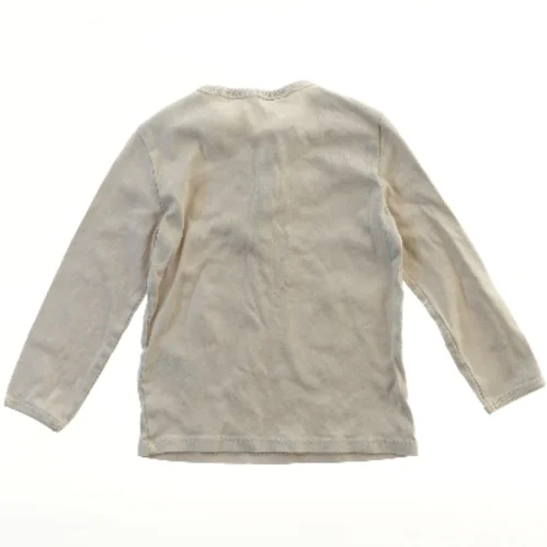 Langærmet bluse med knapper fra H&M (str. 98)