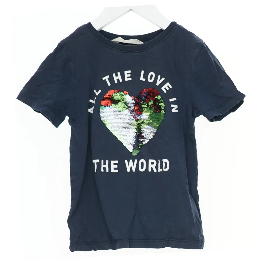 T-shirt med palietter og tekst fra H&M (str. 110)