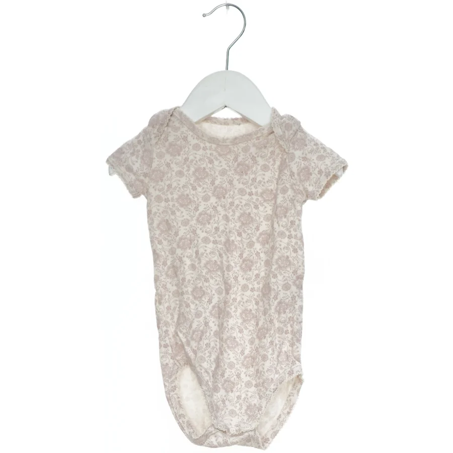 Kortærmet bodystocking med blomstermønster fra Noa Noa (str. 68)