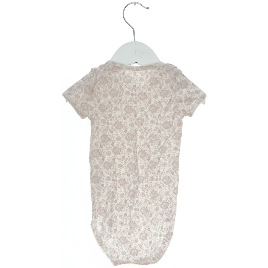 Kortærmet bodystocking med blomstermønster fra Noa Noa (str. 68)
