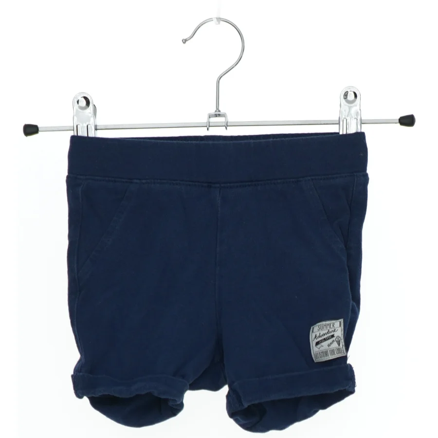 Mørkeblå shorts til børn fra H&M (str. 74)