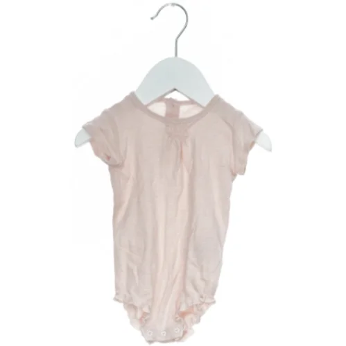 Lyserød bodystocking til baby fra Noa Noa (str. 62)