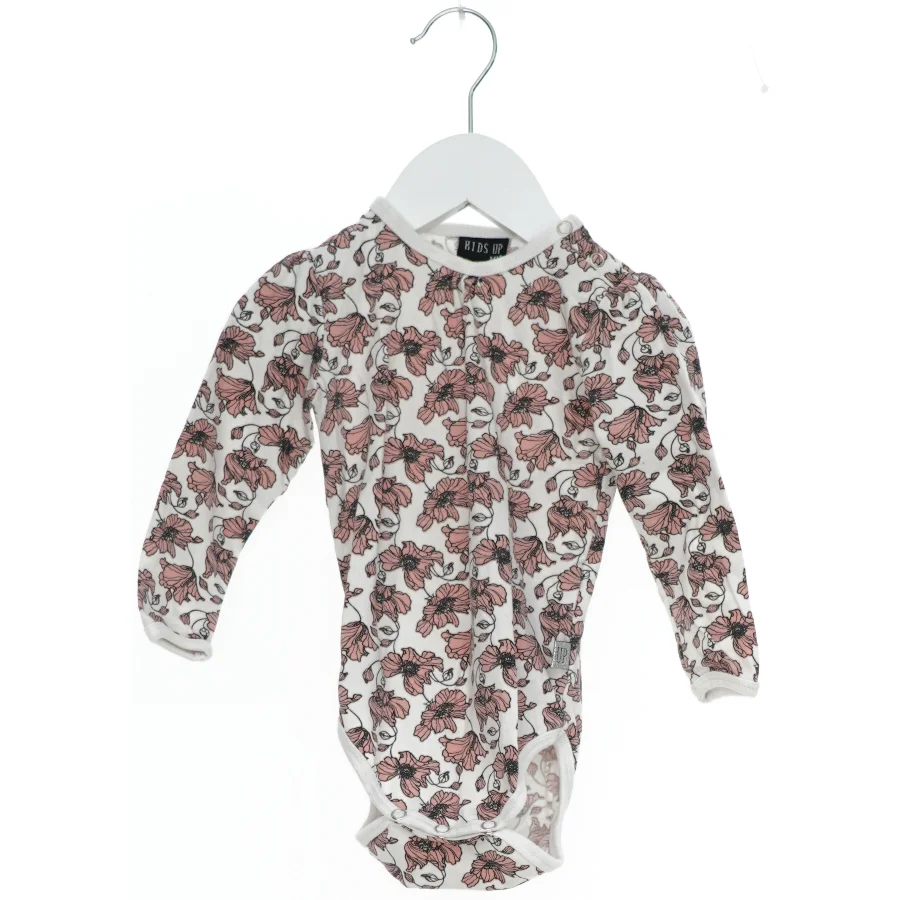 Blomstret bodystocking til børn fra Kids Up (str. 74)