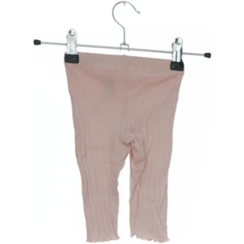 Lyserøde baby leggings med dekorativ sløjfe fra H&M (str. 62)