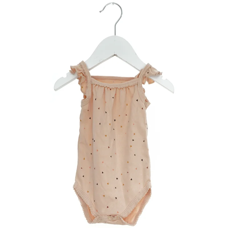 Lyserød bodystocking med triangulært mønster fra Petit (str. 74)