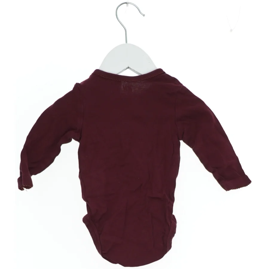 Langærmet bodystocking til baby fra H&M (str. 62)