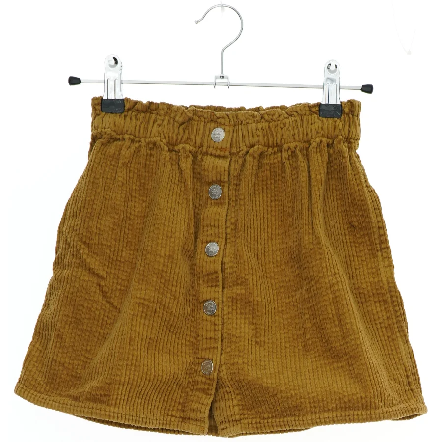 Brun fløjl nederdel med knapper fra H&M (str. 98)