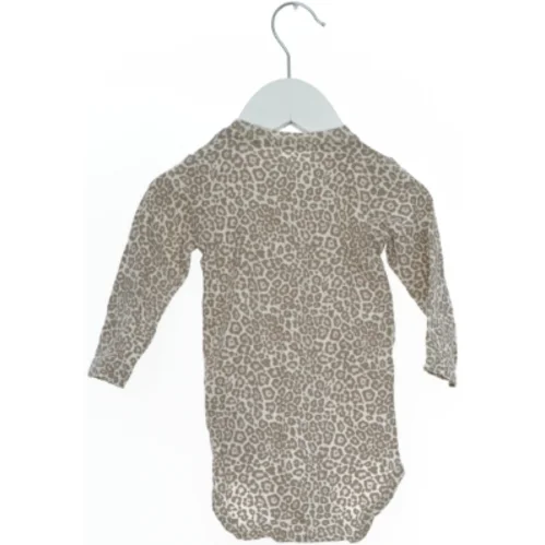 Bodystocking med leopardmønster fra Name It (str. 68)