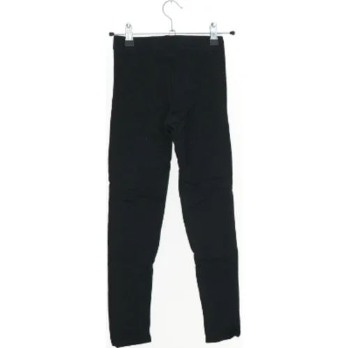 Sorte leggings fra H&M (str. 134)