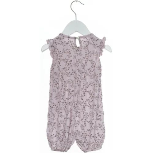 Mønstret Heldragt fra Hust & Claire (str. 74)