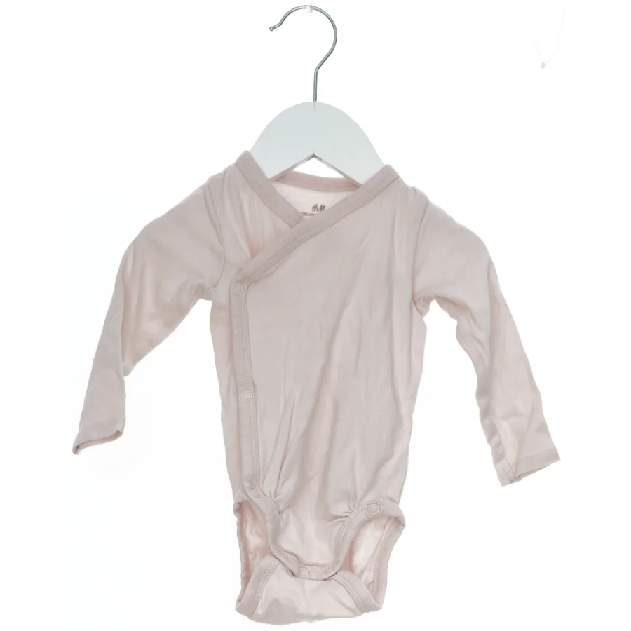 Langærmet bodystocking til baby fra H&M (str. 68)