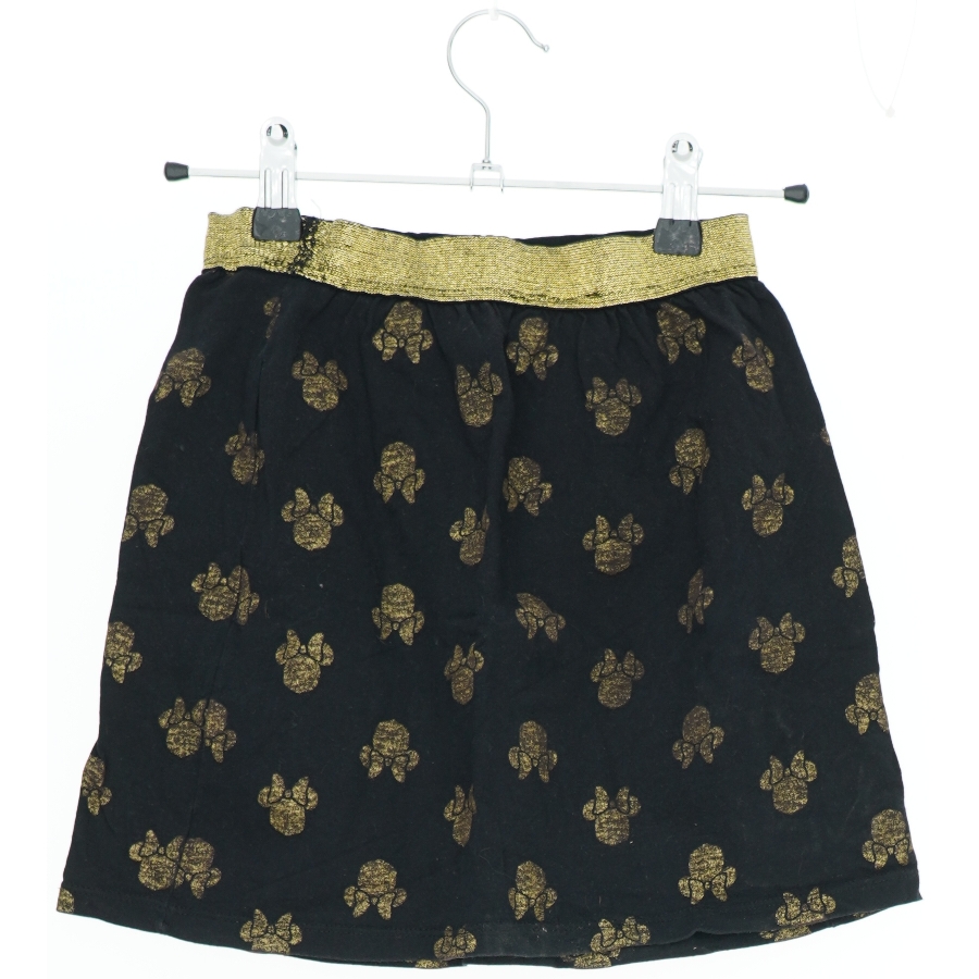 Nederdel med gyldne accenter fra Disney (str. 110)