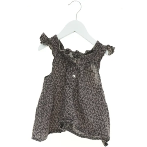 Top fra Pomp de Lux (str. 92 cm)