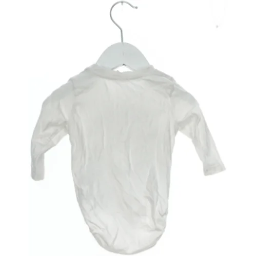 Hvid bodystocking med print fra H&M (str. 62)