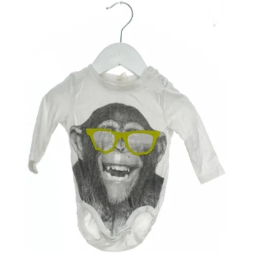 Hvid bodystocking med print fra H&M (str. 62)