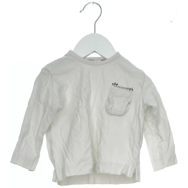 Langærmet bluse med lomme fra Zara (str. 74)