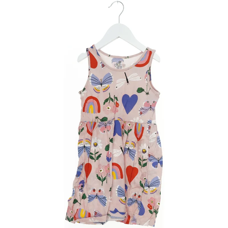 Børnekjole med farverige mønstre fra H&M (str. 110)