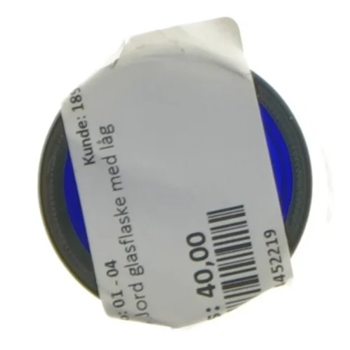 Nilens Jord Blå glasflaske med låg fra Neals Yard (str. 13 cm)