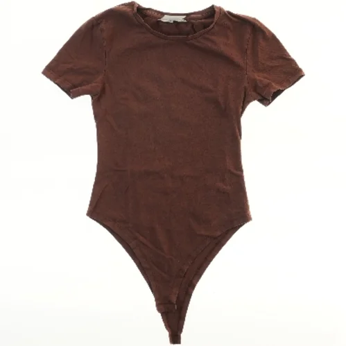 Brun kortærmet bodystocking fra Primark (str. 146)