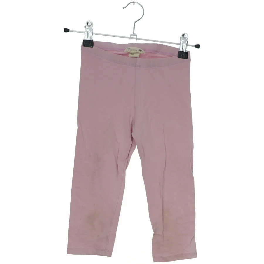 Lyserøde leggings fra H&M (str. 122)