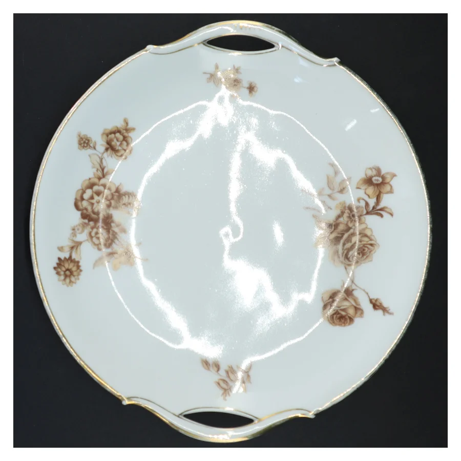 Porcelænsfad med håndtag og blomsterdekoration (str. Ø 25 cm)