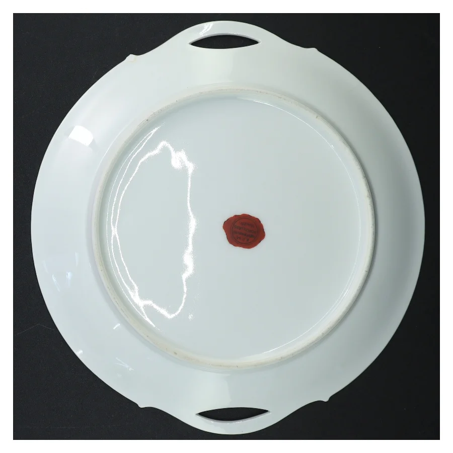 Porcelænsfad med håndtag og blomsterdekoration (str. Ø 25 cm)