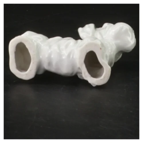 Porcelænsfigur hund (str. 6 cm)