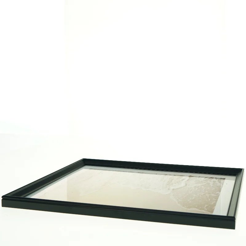 Indrammet billede med strandmotiv fra IKEA (str. 33 x 43 cm)