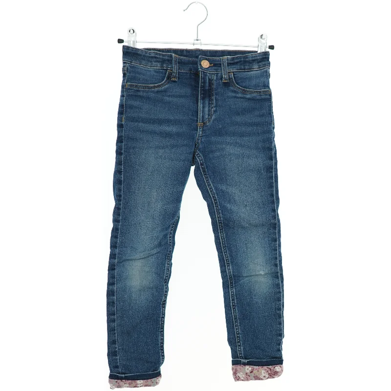 Skinnyfit lined jeans med blomstrede opslag fra H&M (str. 116)