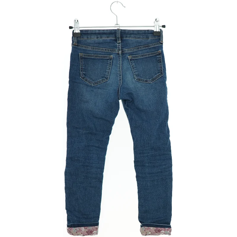 Skinnyfit lined jeans med blomstrede opslag fra H&M (str. 116)