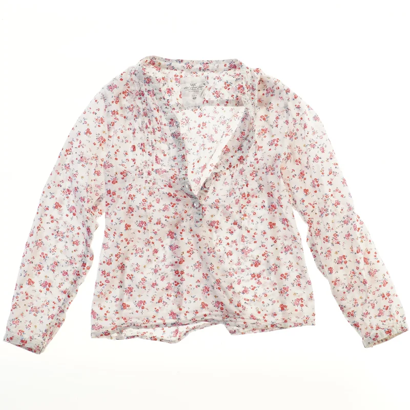 Bluse med blomsterprint fra H&M (str. 140)
