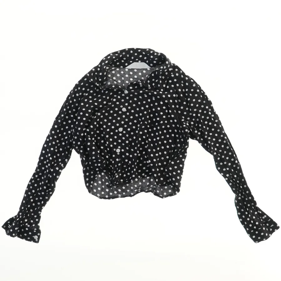 Prikket bluse med lange ærmer fra H&M (str. 140)