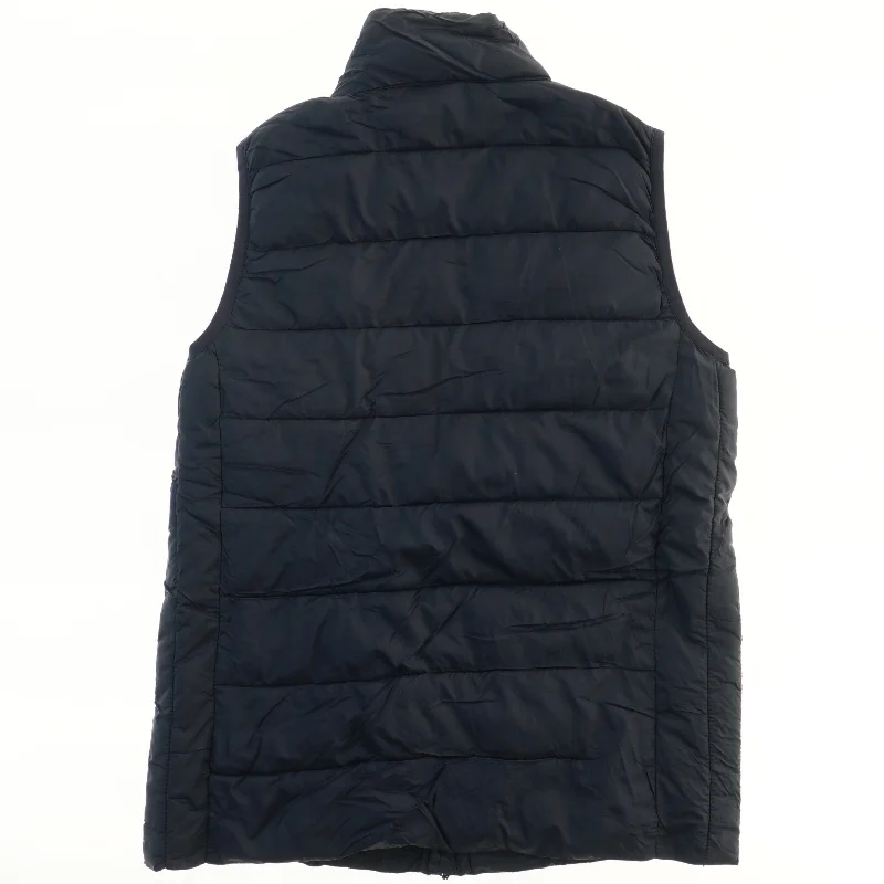 Mørkeblå quiltet vest fra Horze (str. 158)