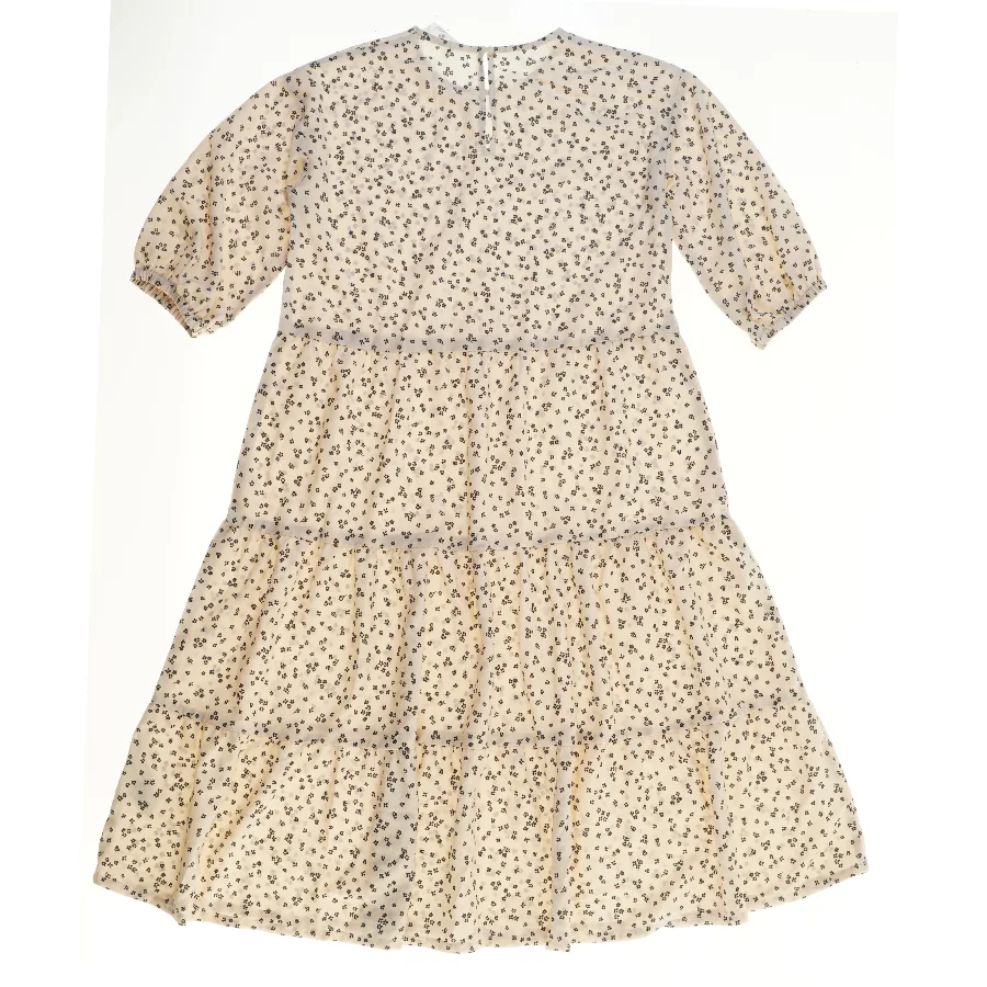 Langærmet kjole med blomsterprint fra H&M (str. 152)