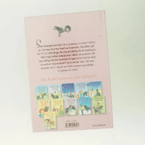 Pjok og Petrine 1 - En pony i præmie af Kirsten Sonne Harild (Bog)