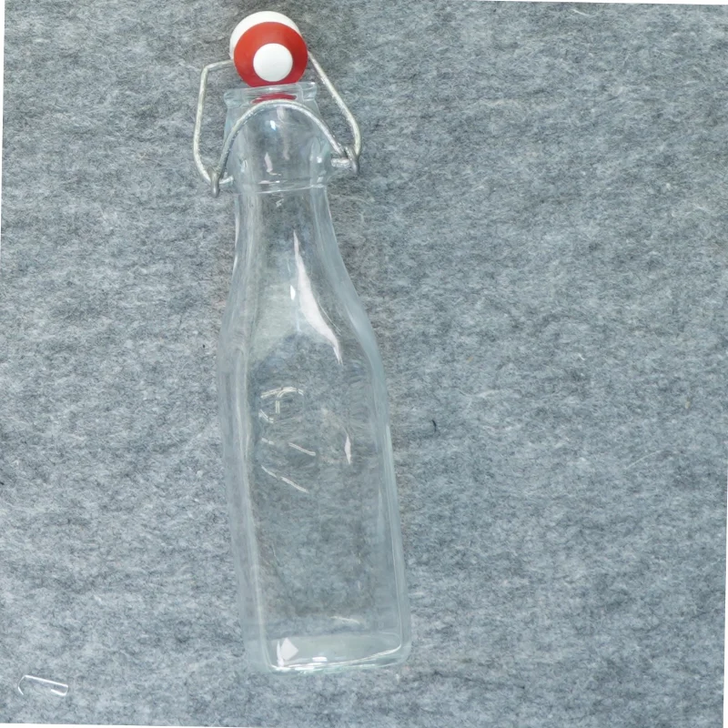 Flaske med patentprop (str. 19 x 5 cm)