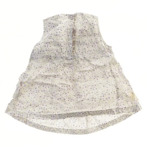 Bluse med blomsterprint fra H&M (str. 74)