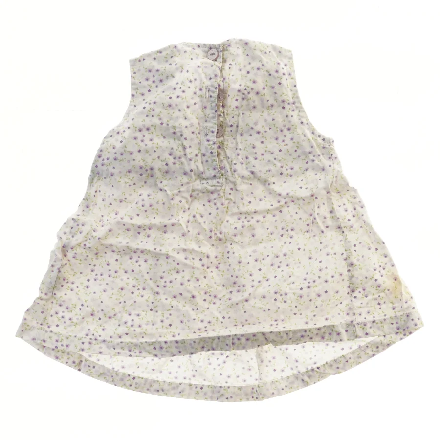 Bluse med blomsterprint fra H&M (str. 74)