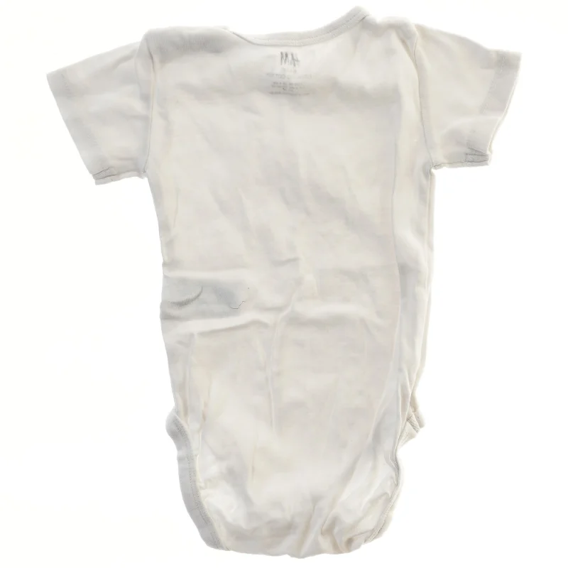 Hvid bodystocking til baby fra H&M (str. 68)