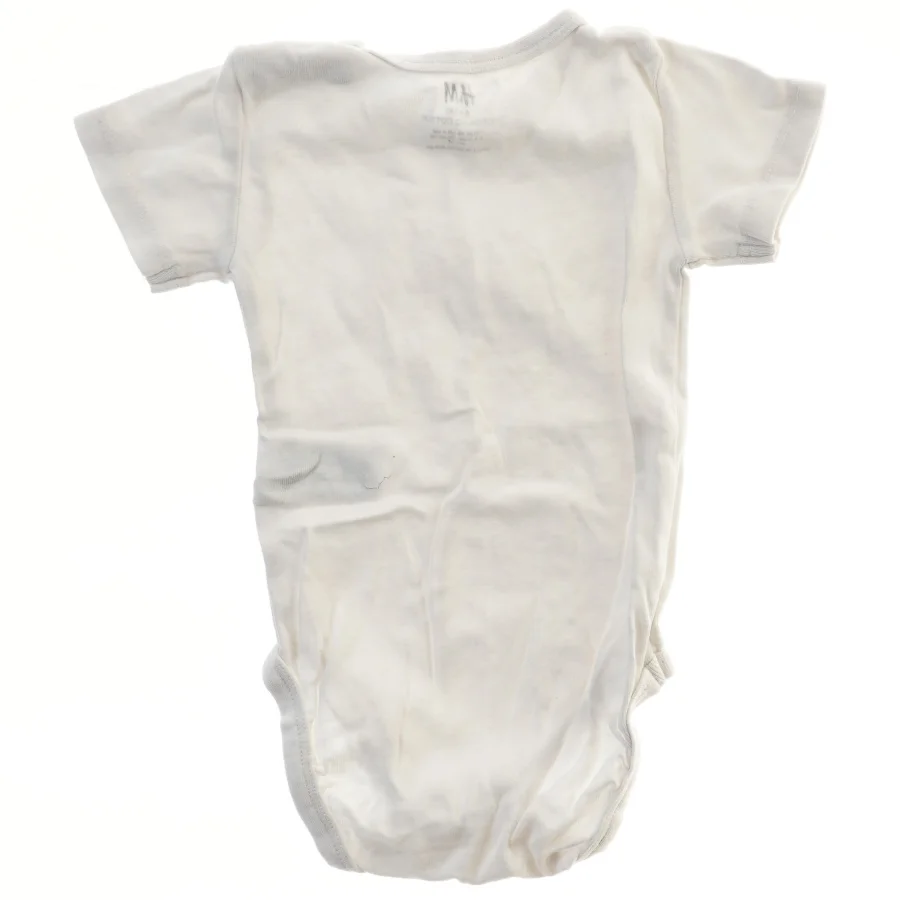Hvid bodystocking til baby fra H&M (str. 68)