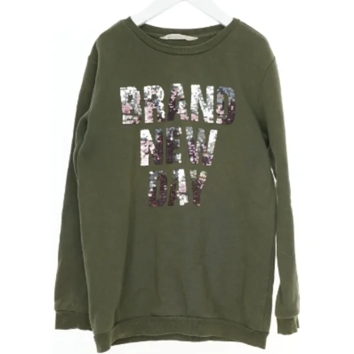 Grøn sweatshirt med palietter fra H&M (str. 146)